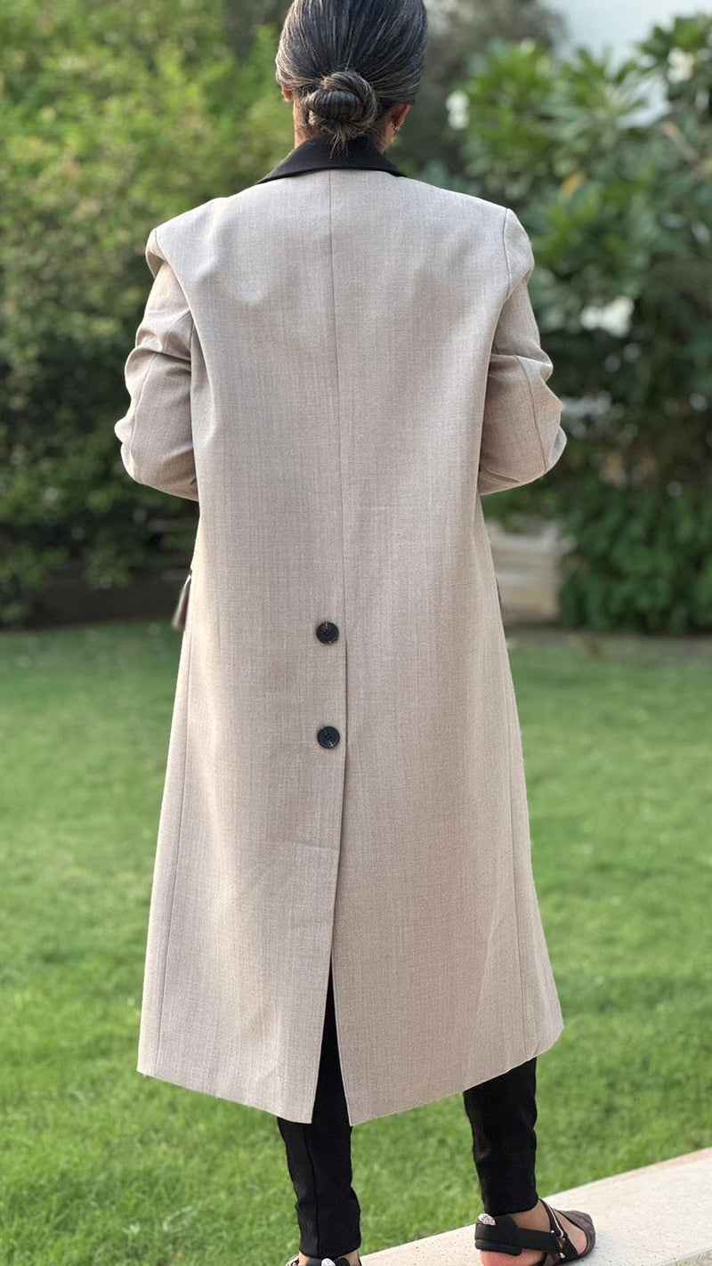Beige long blazer with black stitching