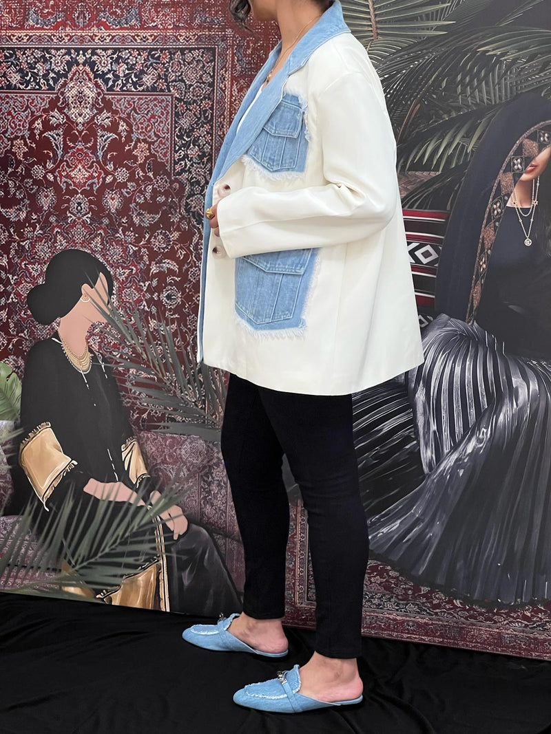 Cream jacket with denim pockets