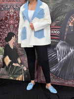 Cream jacket with denim pockets