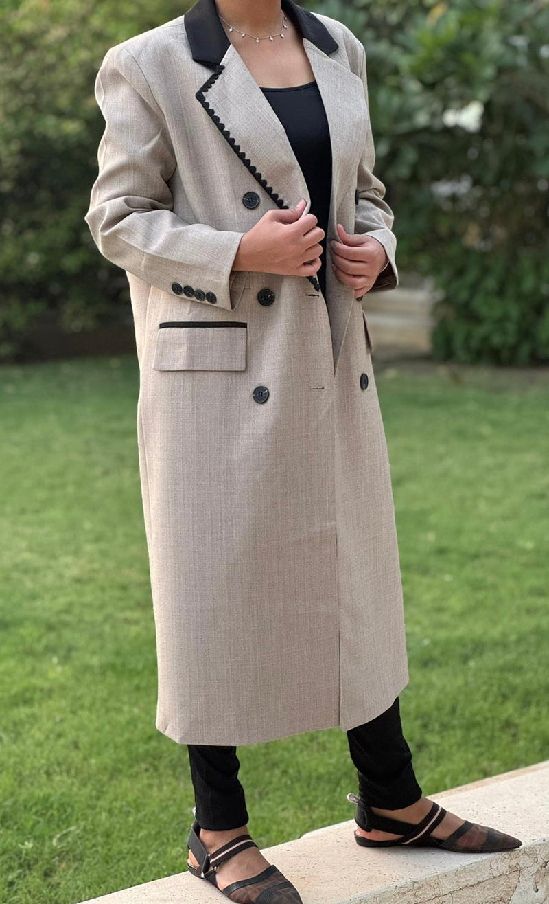 Beige long blazer with black stitching