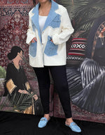 Cream jacket with denim pockets