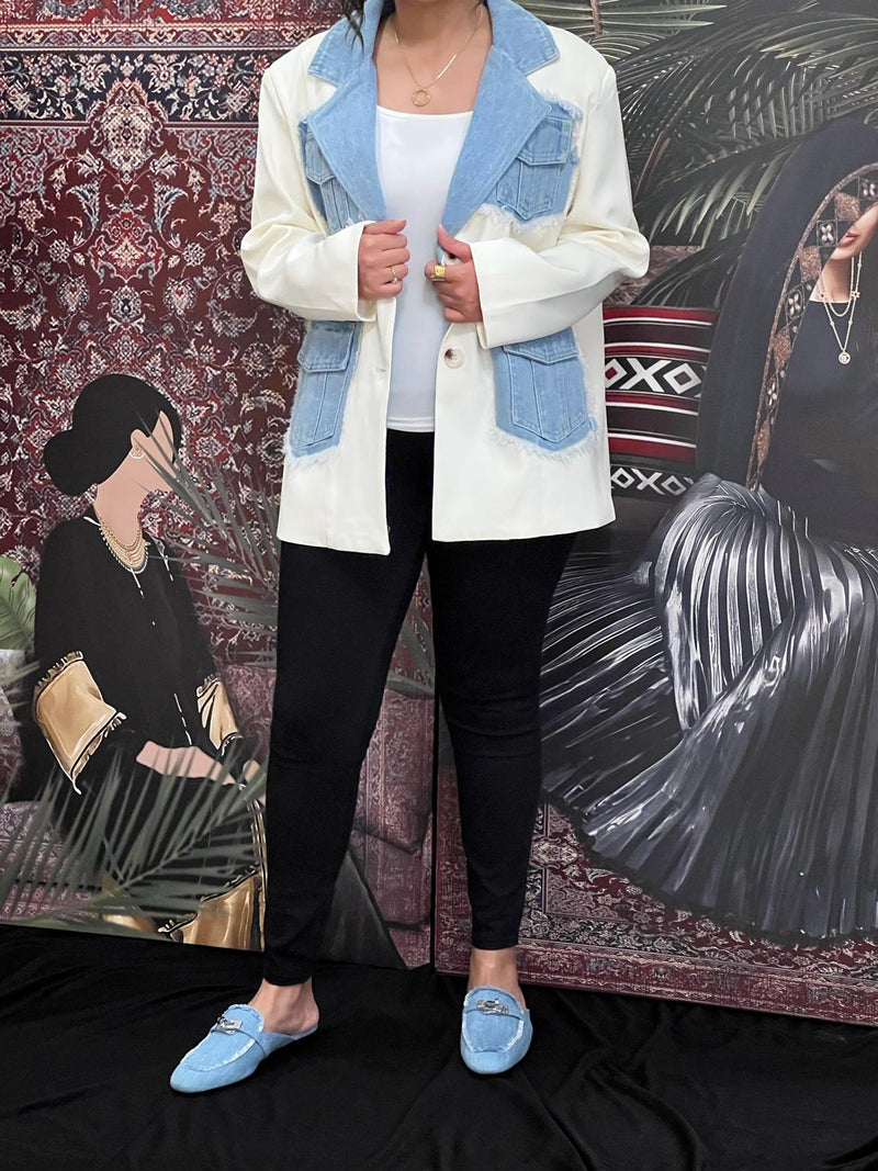 Cream jacket with denim pockets