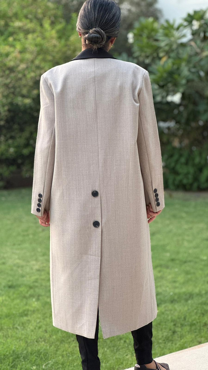 Beige long blazer with black stitching