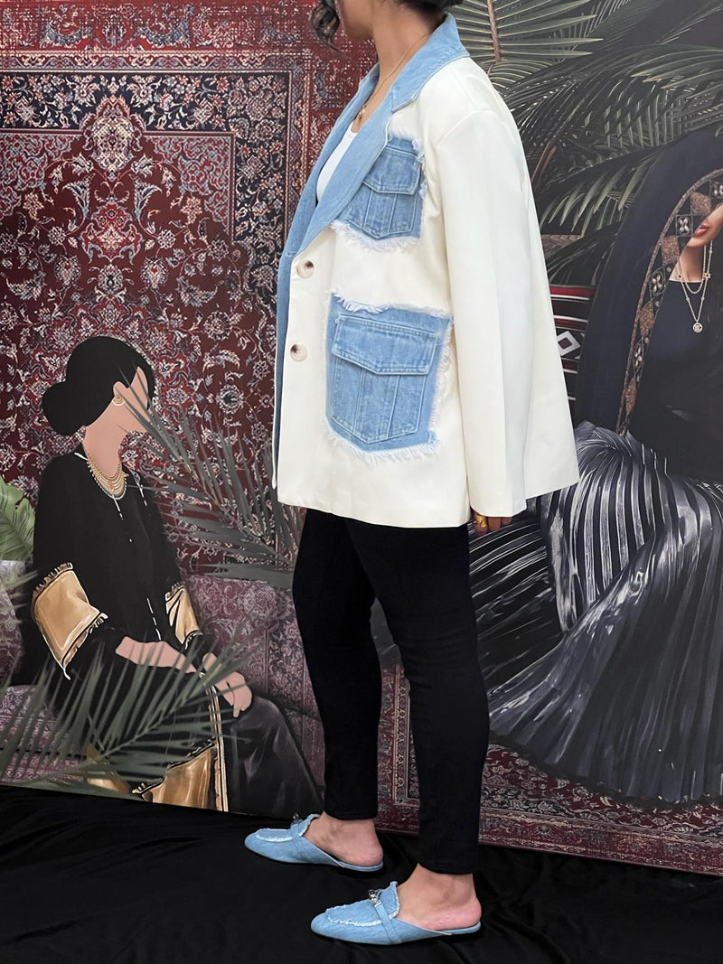 Cream jacket with denim pockets