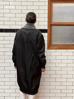 Grey with black jacket