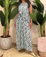 Green sleeveless patterned dress