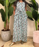 Green sleeveless patterned dress