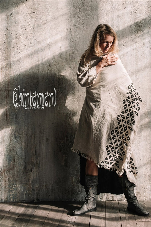 Asymmetric beige and black cardigan