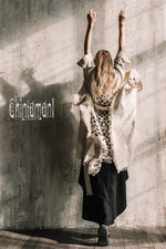 Asymmetric beige and black cardigan