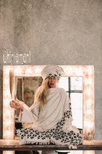 Asymmetric beige and black cardigan