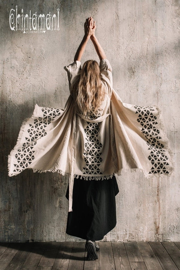 Asymmetric beige and black cardigan