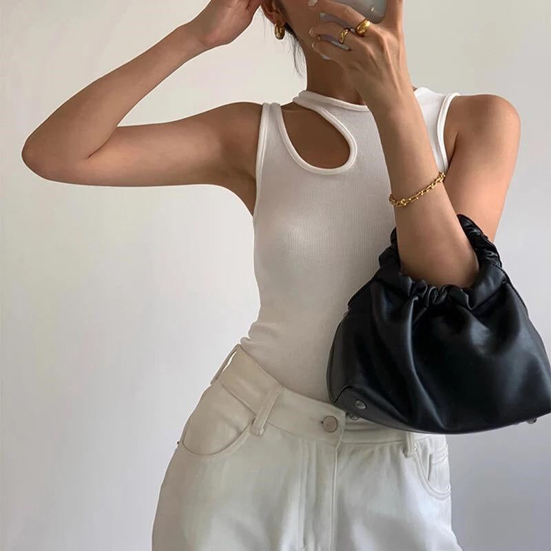 Sleeveless cut off white top