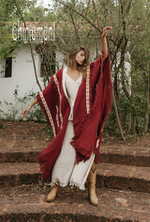 Red poncho coat