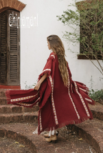 Red poncho coat