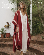 Red poncho coat